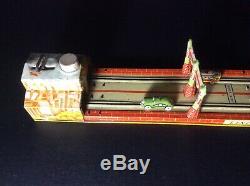 Vintage 1930's Lincoln tunnel tin toy by UNIQUE ART MFG. INC USA, WIND UP