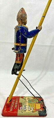 Vintage 1930's MARX Toys Climbing Fireman Wind Up Tin Metal Toy