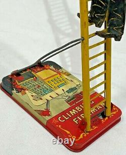 Vintage 1930's MARX Toys Climbing Fireman Wind Up Tin Metal Toy