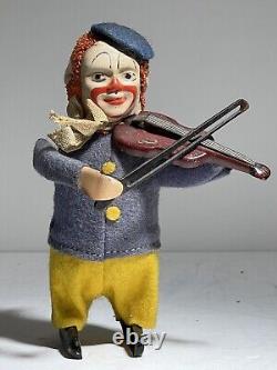 Vintage 1930's Schuco Wind Up Toy Clown Playing Violin Blue/Yellow Germany