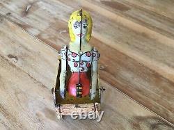 Vintage 1945 Unique Art Lil Abner and Dogpatch Band Tin Wind-up Toy