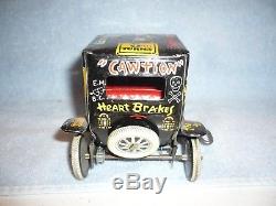 Vintage 1950's Marx tin lithographed wind up old jalopy toy car works