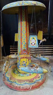 Vintage 1952 Chein RIDE A ROCKET Tin Litho Wind-up Toy