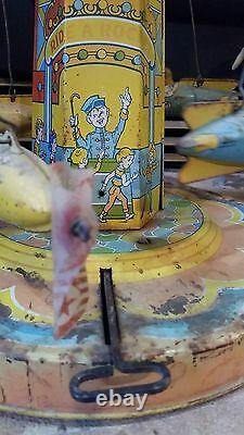 Vintage 1952 Chein RIDE A ROCKET Tin Litho Wind-up Toy