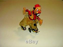 Vintage Antique Tin Litho Wind Up TPS Hobo Skating Clown