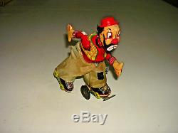 Vintage Antique Tin Litho Wind Up TPS Hobo Skating Clown