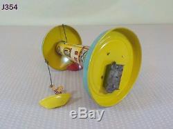 Vintage Antique Unique Art Mfg. Company Tin Wind Up Toy Sail Away Carousel Rare