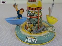 Vintage Antique Unique Art Mfg. Company Tin Wind Up Toy Sail Away Carousel Rare