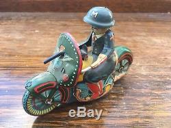Vintage Antique Windup Motorcycle Tin Toy P. D. With Front Gun