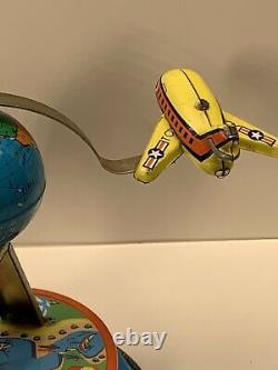 Vintage Around The Globe Air Plane Carnival Ride Wind up toy, Working Condition
