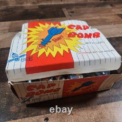 Vintage Box Of 48 1960s Bee Cap Bomb Toys Missles Shaped Brand New Complete Rare