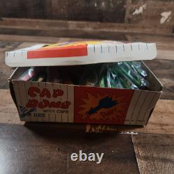 Vintage Box Of 48 1960s Bee Cap Bomb Toys Missles Shaped Brand New Complete Rare