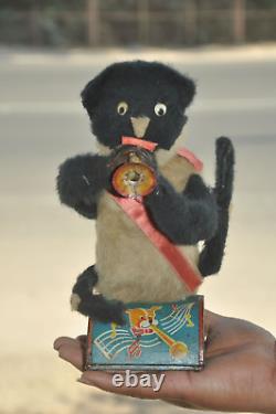 Vintage Dog Playing Bigule Textured Cloth Battery Litho Tin Toy, Japan
