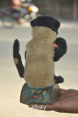 Vintage Dog Playing Bigule Textured Cloth Battery Litho Tin Toy, Japan