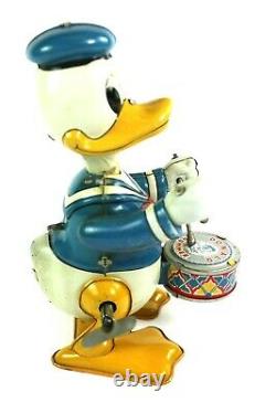 Vintage Donald Duck Mech. Drummer Rocker Tin Wind Up Walt Disney Productions