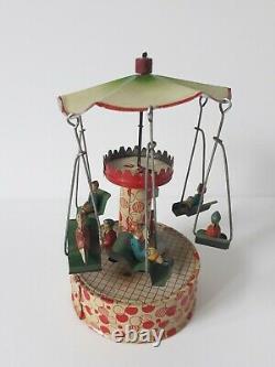 Vintage Gunthermann, Bing, Distler Windup tin carousel swings toy, Germany-SUPERB