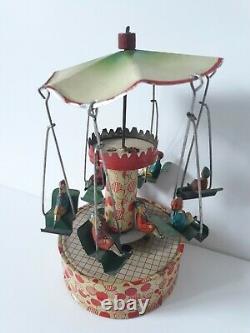 Vintage Gunthermann, Bing, Distler Windup tin carousel swings toy, Germany-SUPERB