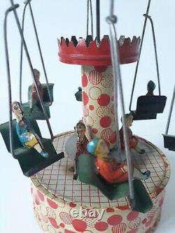 Vintage Gunthermann, Bing, Distler Windup tin carousel swings toy, Germany-SUPERB