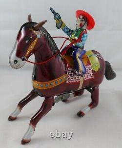 Vintage Japan Tin Wind Up Cowboy on Horse Toy with Original Box Western Hero