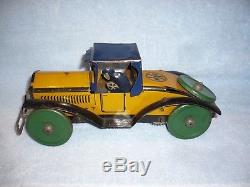 Vintage MARX Tin wind up 50 50 roadster Toy Car great colors