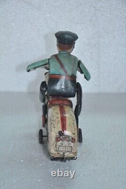 Vintage MT Trademark Police Litho Motorcycle Rider Battery Tin Toy, Japan