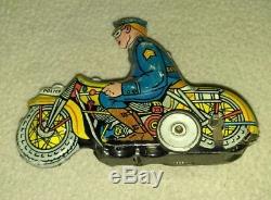 Vintage MYSTIC MOTORCYCLE TIN WINDUP TOY ORIGINAL MARX policeman motorcycle