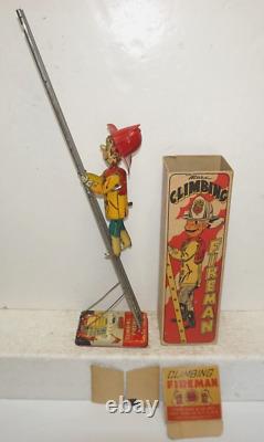 Vintage Marx Toy Climbing Fireman Wind-up Tin Litho With Ladder In Ob