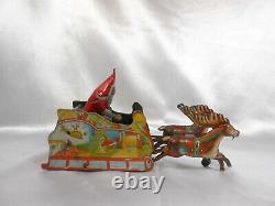 Vintage Metal Strauss Santee Claus Wind Up Toy Dated 1921