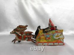 Vintage Metal Strauss Santee Claus Wind Up Toy Dated 1921