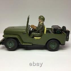 Vintage Nomura TN Battery Operated Lithographed Army Jeep With Two Soldiers