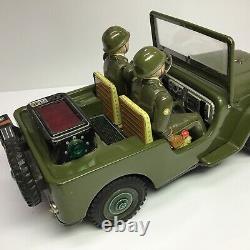 Vintage Nomura TN Battery Operated Lithographed Army Jeep With Two Soldiers