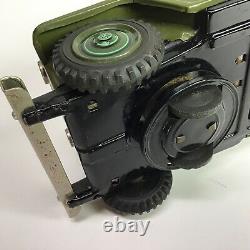 Vintage Nomura TN Battery Operated Lithographed Army Jeep With Two Soldiers