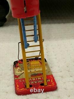 Vintage Original Marx Wind-Up Climbing Ladder Fireman Tin Toy Works