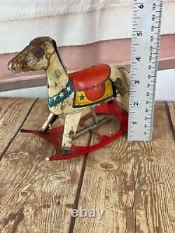 Vintage Rocking Horse Tin Toy Made in Japan Winds up and rocks