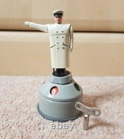 Vintage Schuco Flic 4520 Traffic police clockwork windup tin toy, Germany-WORKS