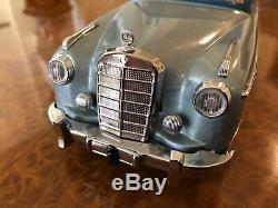 Vintage Schuco Rollfix 1085 Mercedes-Benz 220 SE Momentum Drive Tin Toy