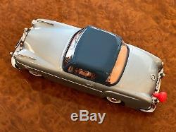 Vintage Schuco Rollfix 1085 Mercedes-Benz 220 SE Momentum Drive Tin Toy