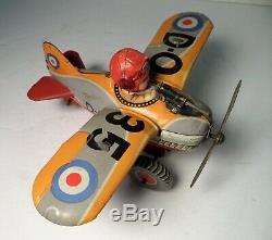 Vintage Tin Japan Plane Wind Up D-O 35 Fire Sparkle Litho Fighter Airplane Toy
