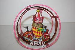 Vintage Tin Round About Circus Bear Clown Cycle made in japan in the 1960's