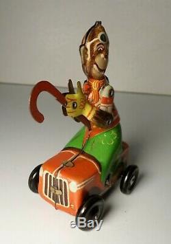 Vintage Tin Toy Windup Litho Monkey on Car with Cane Penny Toy