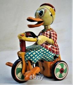 Vintage Tin Wind Up Toy Duck Riding Trike