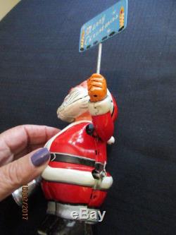 Vintage Tin Wind-up Santa Claus By T. N. Japan