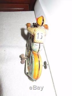 Vintage Tin toy motorcycle wind up technofin working