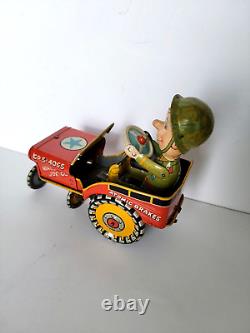 Vintage Unique Art G. I. Joe Jouncing Jeep Tin Wind-Up Toy
