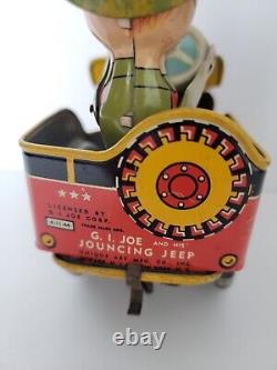 Vintage Unique Art G. I. Joe Jouncing Jeep Tin Wind-Up Toy