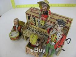 Vintage Unique Art Lil' Abner & The Dog Patch 4 Man Band Tin Litho Wind Up Toy