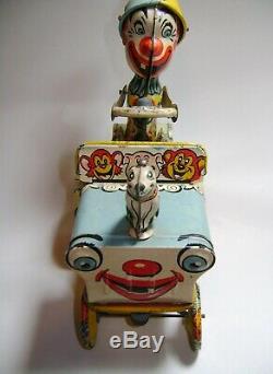 Vintage Unique Art Mfg Co. Artie The Clown Car Tin Litho Wind Up Toy U. S. A