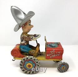 Vintage Unique Art Rodeo Joe Crazy Car Wind Up Tin Toy Works Great