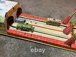 Vintage Unique Art's Mfg Co. Tin Litho Lincoln Tunnel Wind Up Toy, Works Perfect