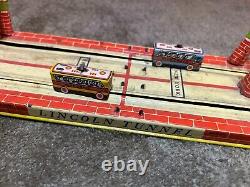 Vintage Unique Art's Mfg Co. Tin Litho Lincoln Tunnel Wind Up Toy, Works Perfect